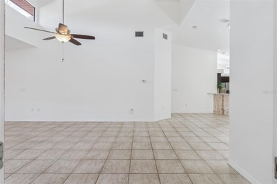 PRESENTING A BEAUTIFUL HOME ON THE GOLF COURSE! This bright and - photo 9