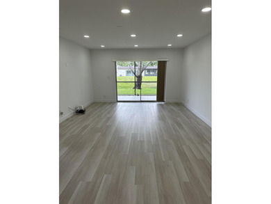 Completely renovated and move-in ready, this stunning villa - photo 9