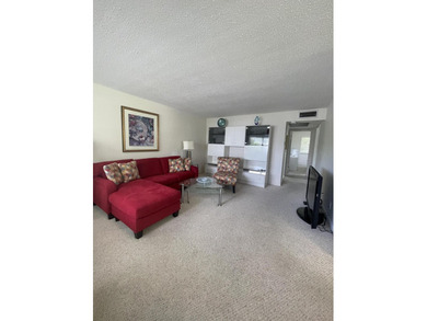 Bright and clean 2/1.5 CORNER condo located on the 2nd floor in - photo 1