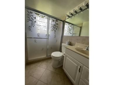 Bright and clean 2/1.5 CORNER condo located on the 2nd floor in - photo 3
