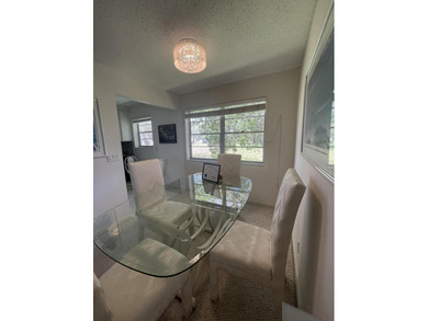 Bright and clean 2/1.5 CORNER condo located on the 2nd floor in - photo 4