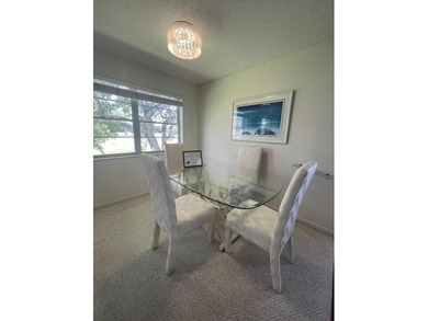 Bright and clean 2/1.5 CORNER condo located on the 2nd floor in - photo 5