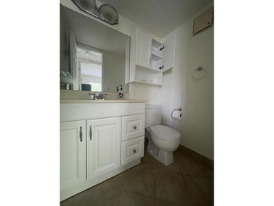 Bright and clean 2/1.5 CORNER condo located on the 2nd floor in - photo 9