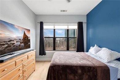 Experience stylish high-rise living in this beautifully designed