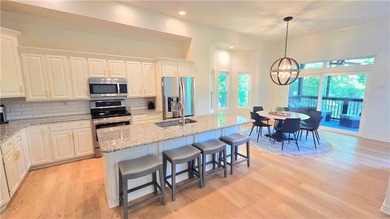 Linn Valley Lakefront living with style! From the moment you - photo 11