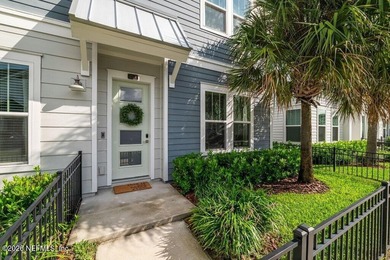Welcome to Tidal Pointe, a gated townhome community in the heart - photo 1