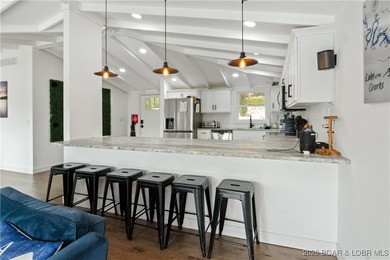 Fully renovated lake home in a prime Lake Ozark location at the - photo 13
