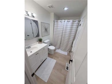 Linn Valley Lakefront living with style! From the moment you - photo 16