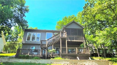Linn Valley Lakefront living with style! From the moment you - photo 35