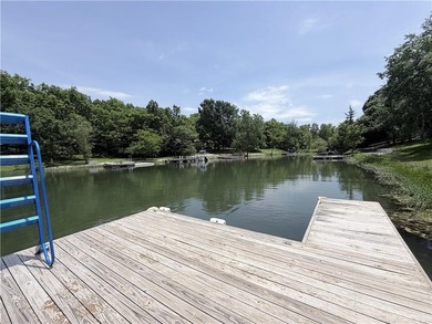 Linn Valley Lakefront living with style! From the moment you - photo 39