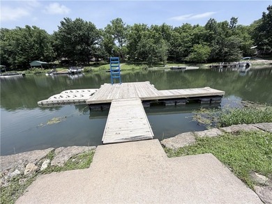 Linn Valley Lakefront living with style! From the moment you - photo 40