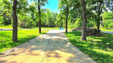 Linn Valley Lakefront living with style! From the moment you - photo 42