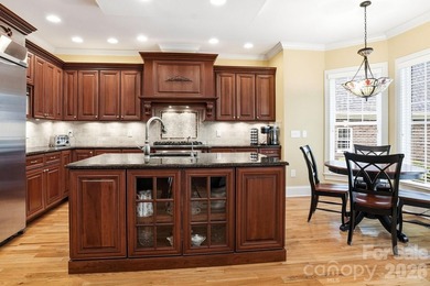 Tucked inside the gated Pebble Bay community, this custom-built - photo 11