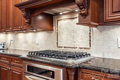 Tucked inside the gated Pebble Bay community, this custom-built - photo 13