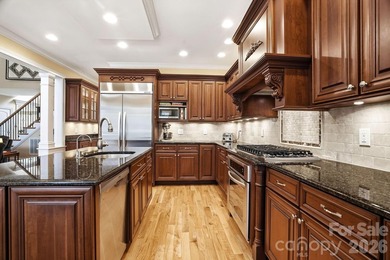 Tucked inside the gated Pebble Bay community, this custom-built - photo 14
