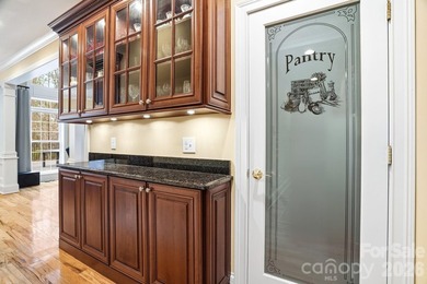 Tucked inside the gated Pebble Bay community, this custom-built - photo 17