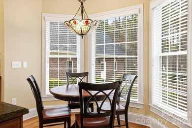 Tucked inside the gated Pebble Bay community, this custom-built - photo 18