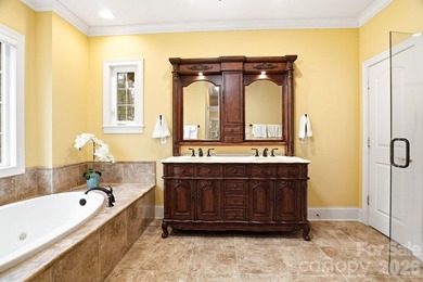 Tucked inside the gated Pebble Bay community, this custom-built - photo 24