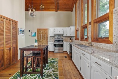 Enjoy lake life at its finest with this beautiful 4-bedroom - photo 4