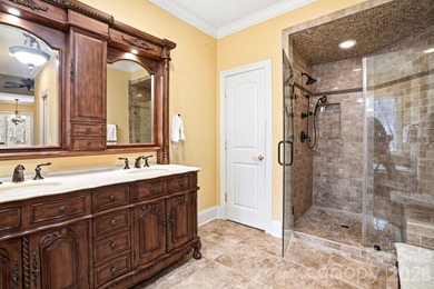 Tucked inside the gated Pebble Bay community, this custom-built - photo 25