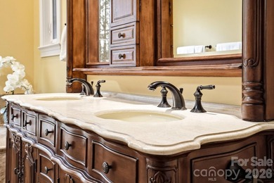 Tucked inside the gated Pebble Bay community, this custom-built - photo 26