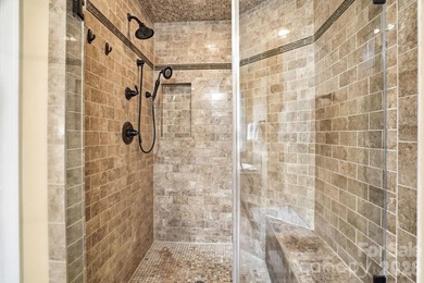 Tucked inside the gated Pebble Bay community, this custom-built - photo 28