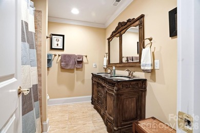Tucked inside the gated Pebble Bay community, this custom-built - photo 34