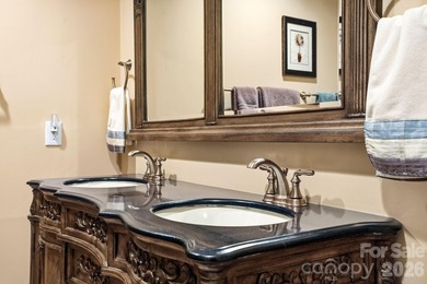 Tucked inside the gated Pebble Bay community, this custom-built - photo 35
