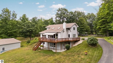 Lake Home For Sale in Williamsburg, Michigan