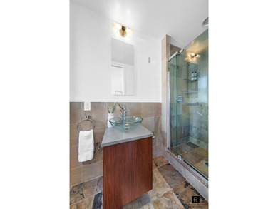 Welcome to Residence 5J. Upon entry, a gracious foyer opens into - photo 5