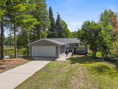 Lake Home For Sale in Prudenville, Michigan