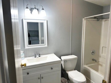 This beautifully renovated home has been completely updated with - photo 14