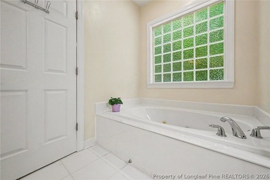 Rare main-level living in Treyburn with private wooded views and - photo 15