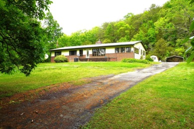 Discover 20 acres of peaceful Tennessee privacy - photo 1
