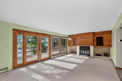 This four-bedroom, two-bath, 2,116-square-foot two-story cabin - photo 8