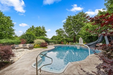 Nestled on a breathtaking lot, this CUSTOM home offers luxurious - photo 11