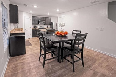 Welcome to effortless living in a serene Hampton neighborhood