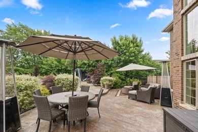 Nestled on a breathtaking lot, this CUSTOM home offers luxurious - photo 12