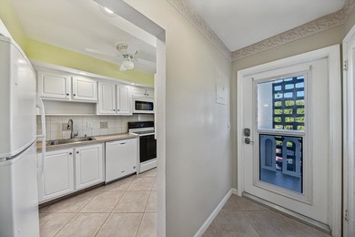 LOVELY EAST FACING UPDATED 2/2 second floor garden view unit in - photo 13