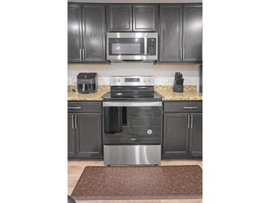 Welcome to effortless living in a serene Hampton neighborhood