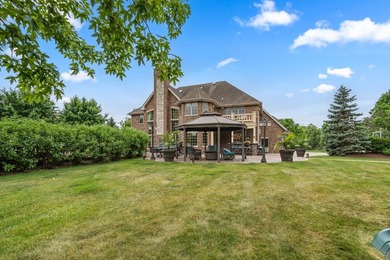 Nestled on a breathtaking lot, this CUSTOM home offers luxurious - photo 15