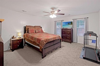 Welcome to effortless living in a serene Hampton neighborhood