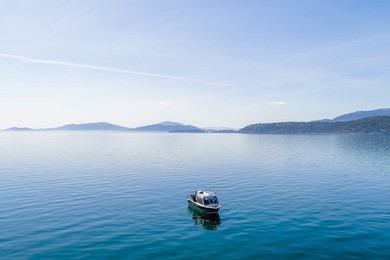 Experience the ultimate Flathead Lake retreat with this rare and - photo 16
