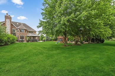 Nestled on a breathtaking lot, this CUSTOM home offers luxurious - photo 17