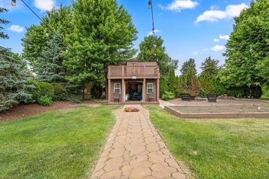 Nestled on a breathtaking lot, this CUSTOM home offers luxurious - photo 18