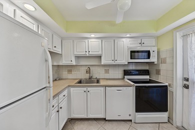LOVELY EAST FACING UPDATED 2/2 second floor garden view unit in - photo 18