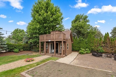 Nestled on a breathtaking lot, this CUSTOM home offers luxurious - photo 19