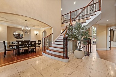 Nestled on a breathtaking lot, this CUSTOM home offers luxurious - photo 20