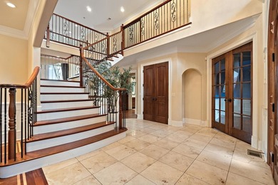 Nestled on a breathtaking lot, this CUSTOM home offers luxurious - photo 21