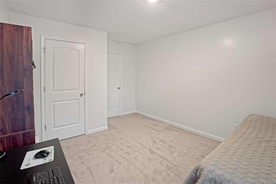 Welcome to effortless living in a serene Hampton neighborhood